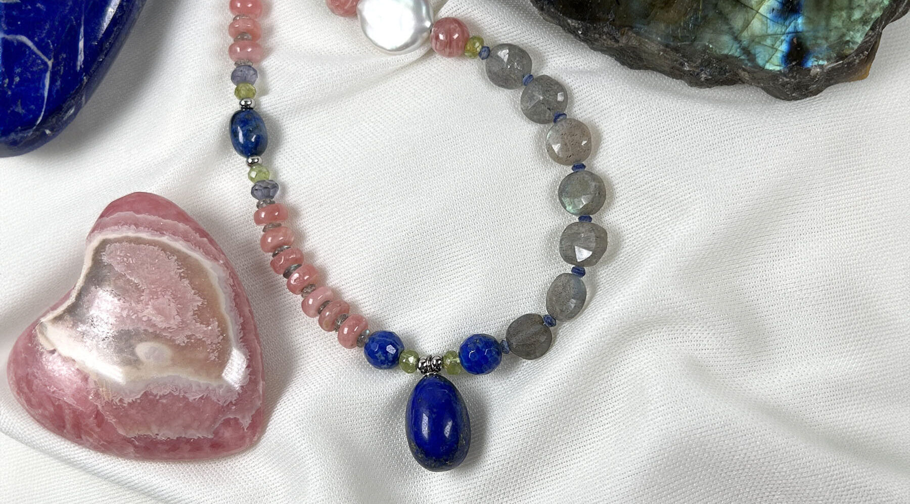 Necklace - Lapis "egg" pendant with rhodochrosite rondelles and labradorite faceted coin beads